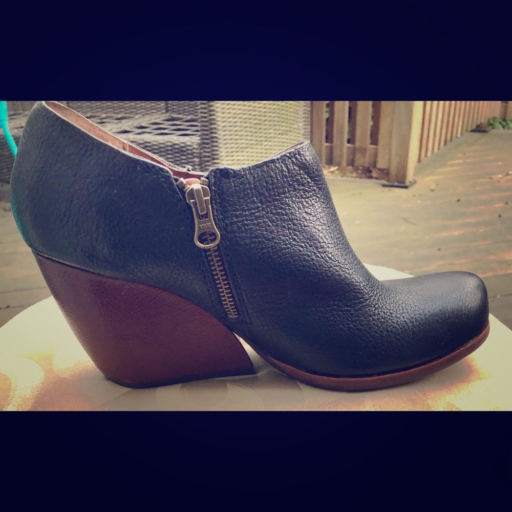 Black leather booties with wooden heel